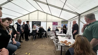 Audience listening to experts on sheep scab.