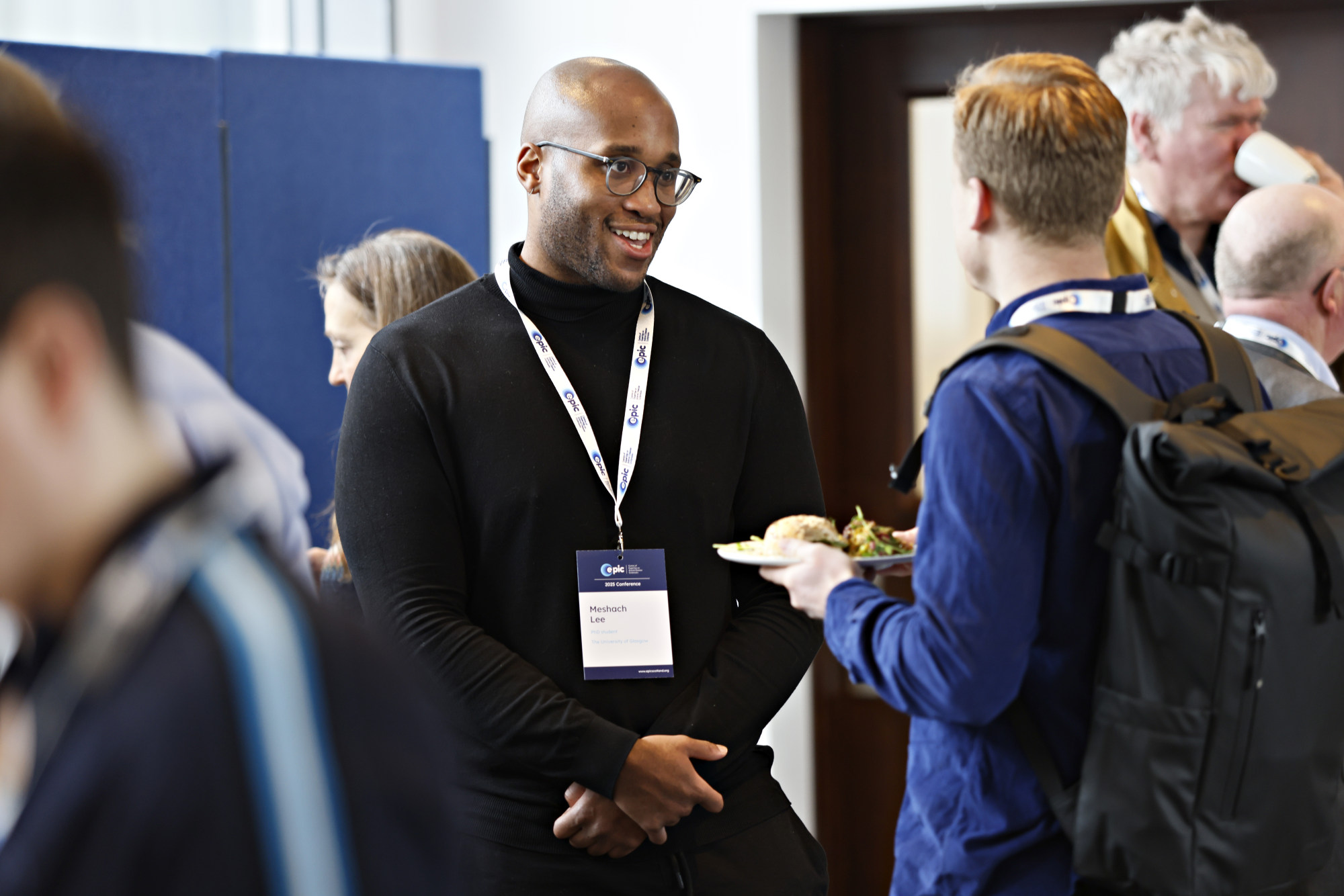 People chatting at EPIC Poster session